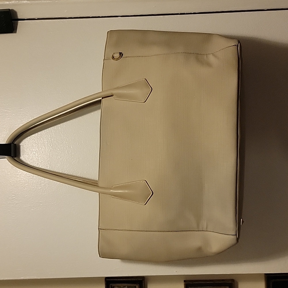 Well used Dagne Dover Legend tote beige